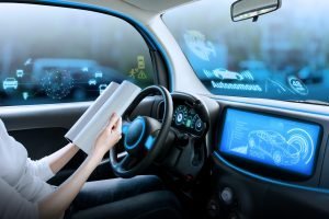 autonomous-self-driving-car-reading-book-300x200.jpg