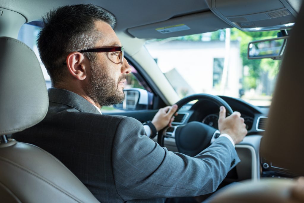 Man-driving-car-Depositphotos_200763528_L-1024x684.jpg