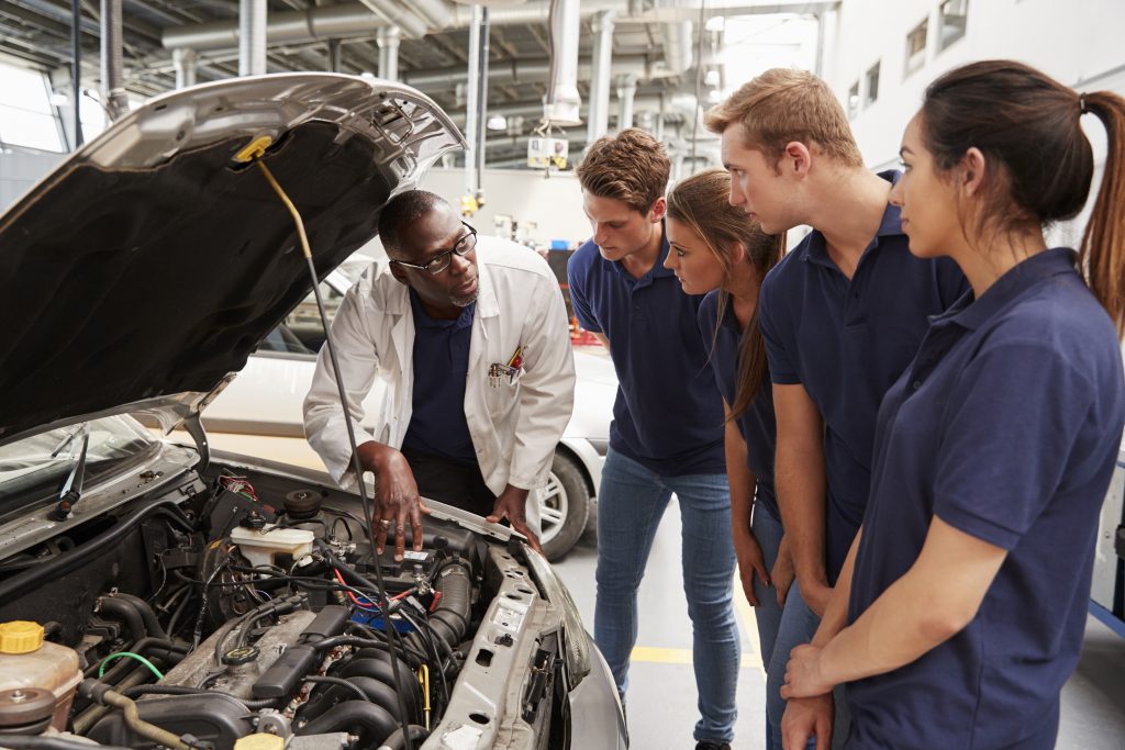 mechanic-instructing-trainees-around-engine-car-1024x683.jpg