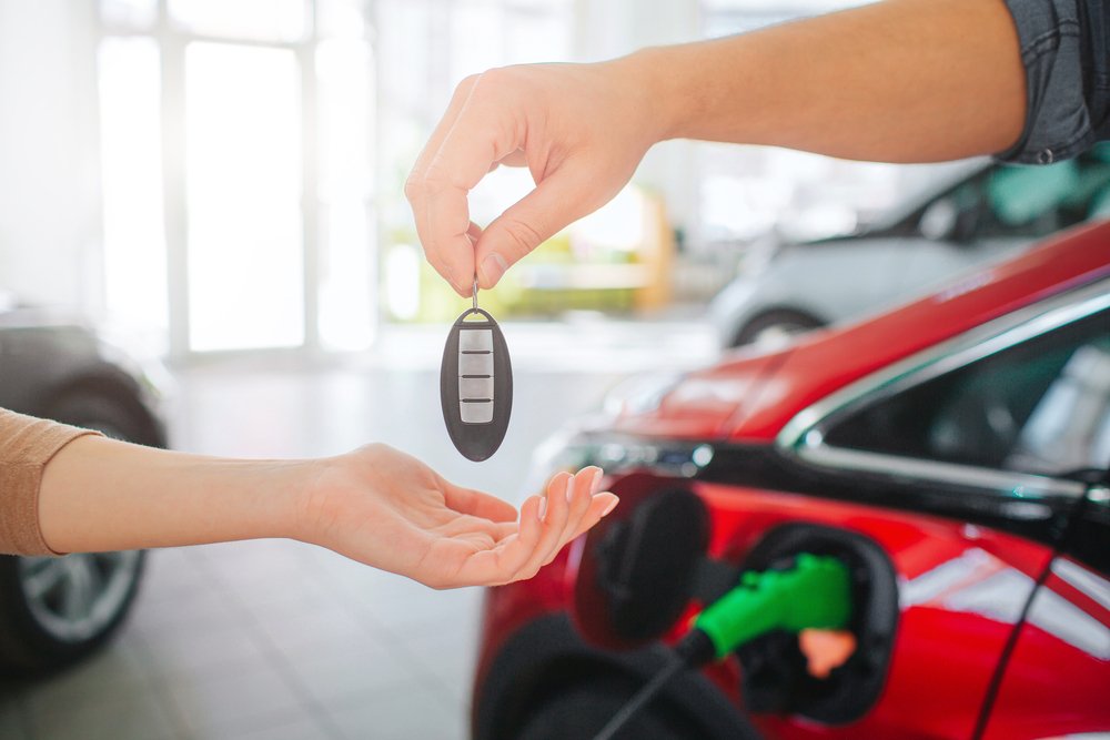 Purchase-buy-electric-car-ev-vehicle-dealer-Depositphotos_251913836_S.jpg
