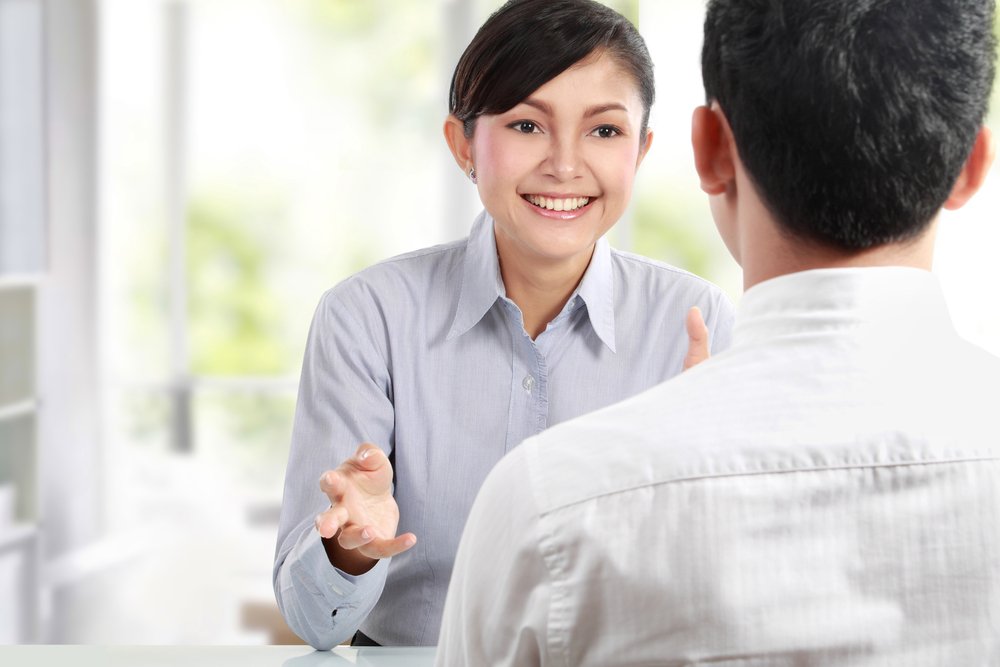 Talking-customer-greeting-service-advisor-Depositphotos_11145874_S.jpg