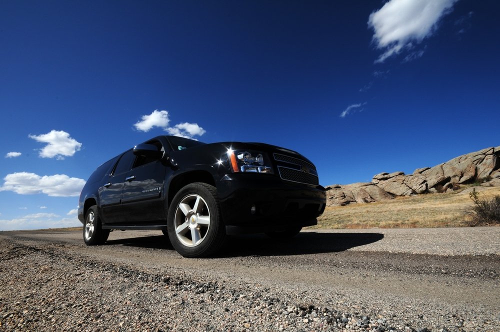 Large-big-SUV-driving-road-Depositphotos_17672281_S.jpg
