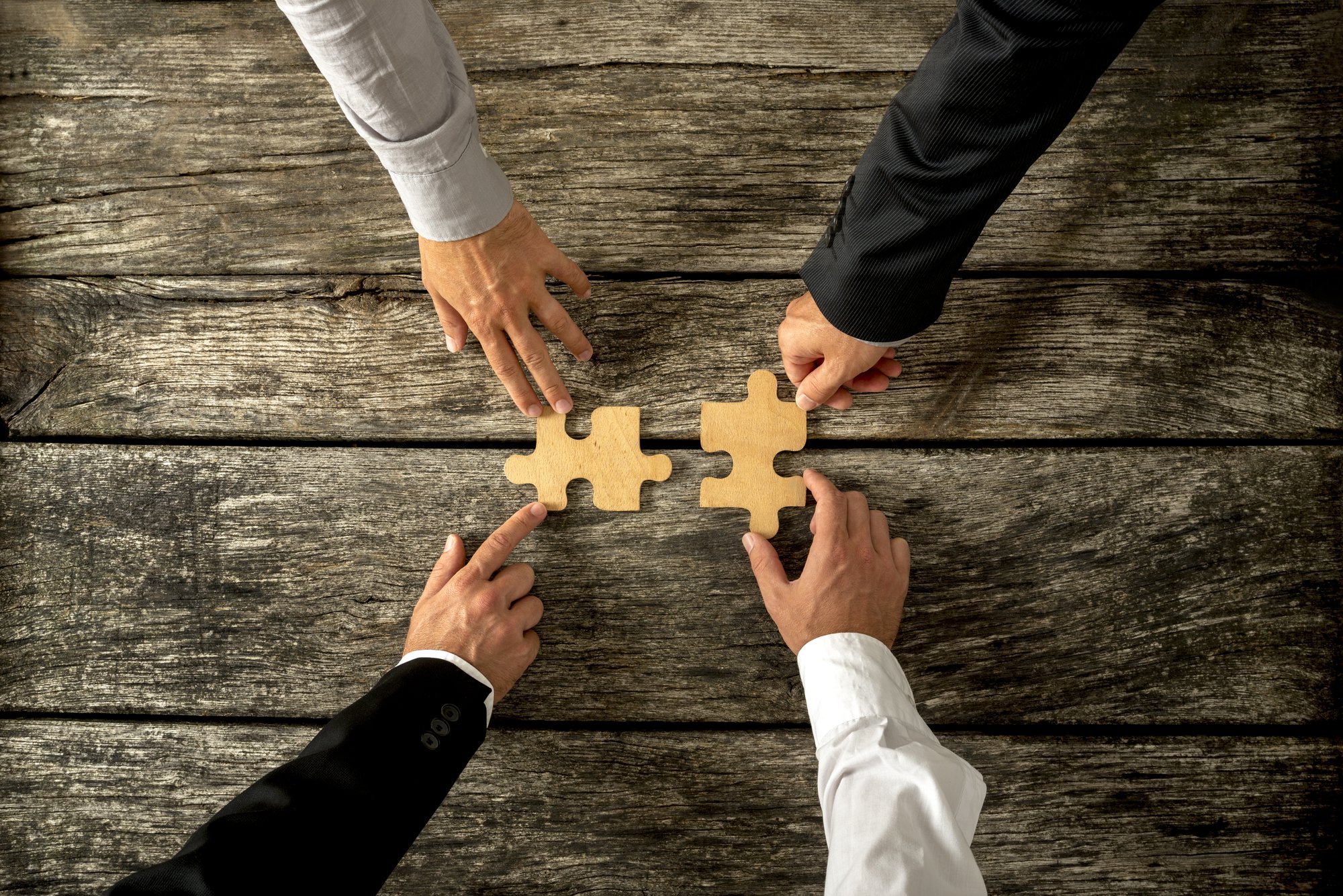 Deal-acquisition-merger-puzzle-Depositphotos_81024772_L.jpg