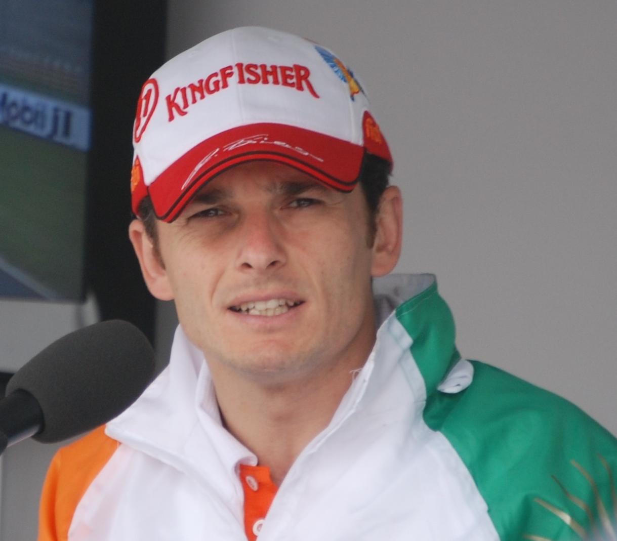 https://upload.wikimedia.org/wikipedia/commons/b/bd/Giancarlo_Fisichella_2009_Australia.jpg